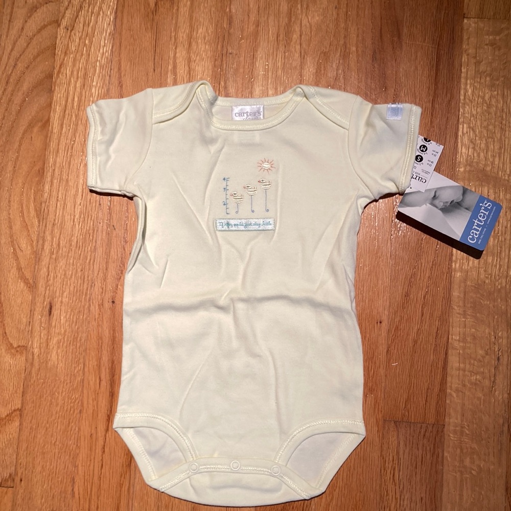 Baby NWT yellow bodysuit. Carter’s.